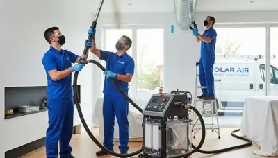 Technician cleaning air ducts for HVAC system in New York, NY home | Five Star Cooling service