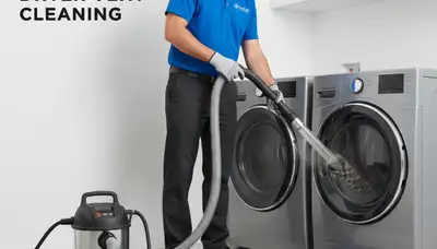 Technician performing professional dryer vent cleaning service in New York, NY home